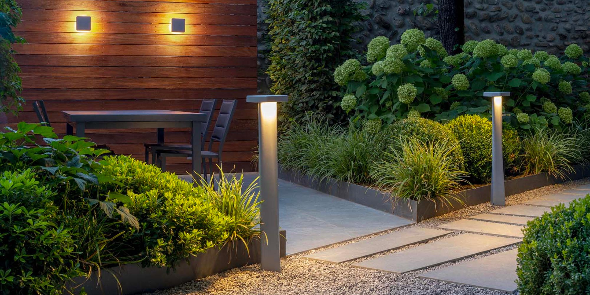 Lighting bollards are versatile and efficient lighting solutions in various outdoor settings, from public parks to private residences. While they are designed the blend with surrounding hardscape and landscape design, the primary function is to improve visibility and safety with energy-efficient LED lighting. Here are a few of our favorites that can complement most outdoor spaces.